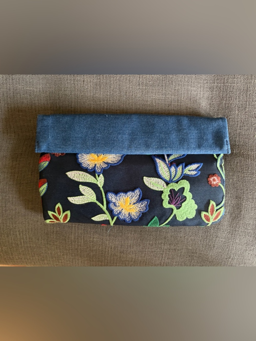 Embroidered denim clutch